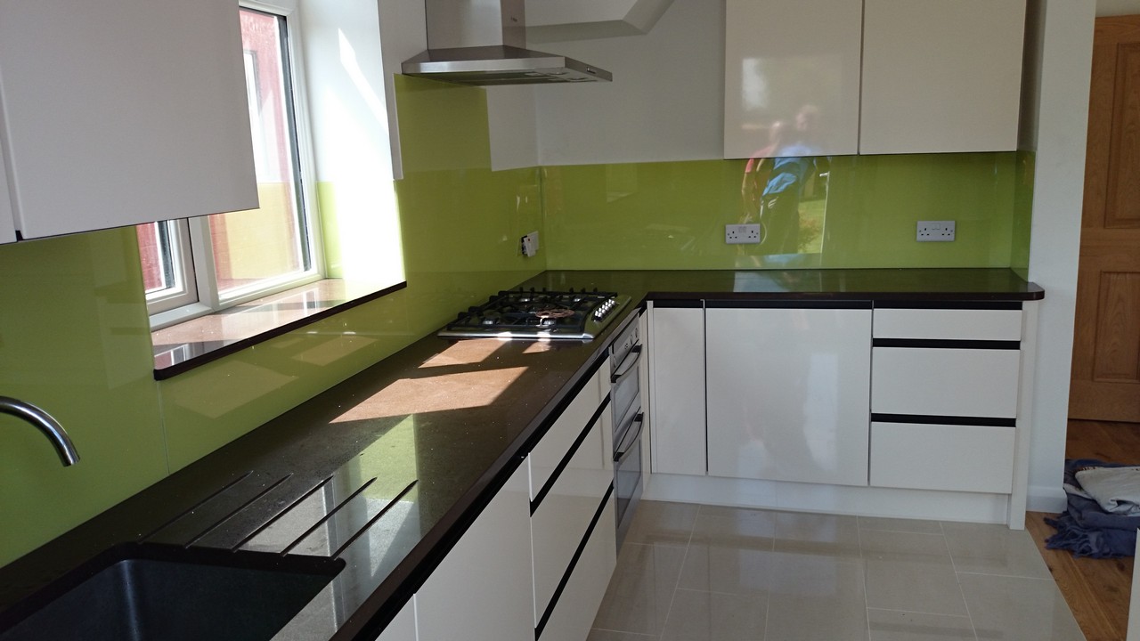 Lime green glass kitchen splashback installed by East Dulwich glaziers